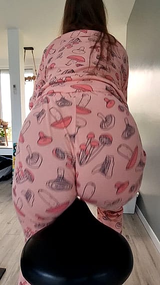 Curvy booty in pyjamas on a spinner'