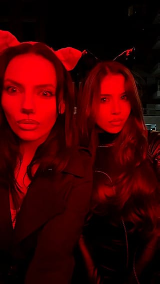 Dafne Keen and Amanda Diaz cat costumes'